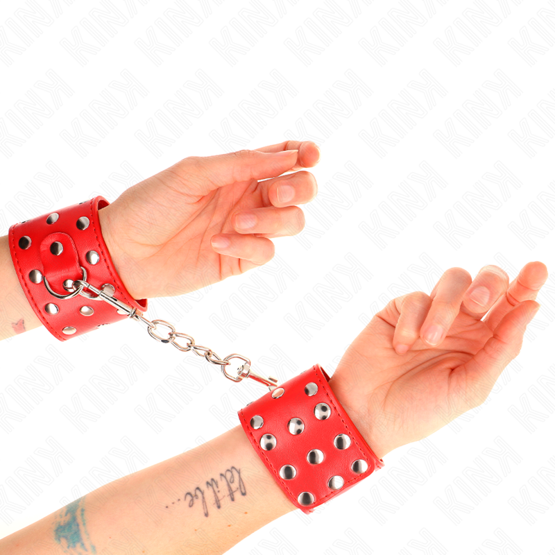 KINK - RED ADJUSTABLE SNAP FASTEN WRIST RESTRAINTS FULL OF RIVETS 19-24 CM X 5.5 CM